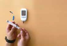 당뇨 전단계, 생활 속 식습관 개선으로 건강 지킨다 a person holding a thermometer next to an electronic device