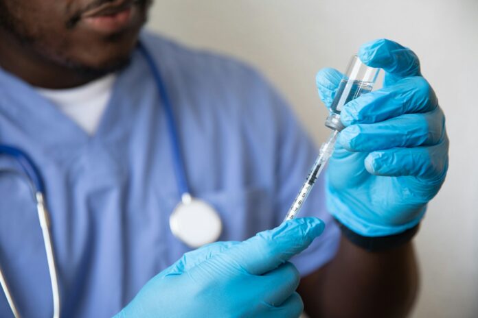 Photo by Nappy a doctor examining a patient's teeth