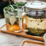 현대인의 스트레스, 대체요법으로 풀다…집에서 실천하는 건강한 루틴 제안 clear glass mug on tray